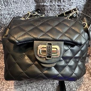 New with tags NWT Badgley Mischka mini backpack bucket bag. Black